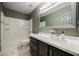 Bathroom features updated vanity and sink next to a shower and tub at 3409 Catherine Mermet Ave, North Las Vegas, NV 89081