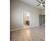 Bedroom features ceiling fan and view to the ensuite bathroom at 3409 Catherine Mermet Ave, North Las Vegas, NV 89081