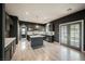 Modern kitchen featuring stainless steel appliances, gray cabinets, and a center island at 3409 Catherine Mermet Ave, North Las Vegas, NV 89081