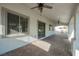 Spacious covered patio featuring ceiling fans and decorative brick flooring at 3409 Catherine Mermet Ave, North Las Vegas, NV 89081