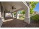 A covered brick patio offers great outdoor living space with mature landscaping at 3409 Catherine Mermet Ave, North Las Vegas, NV 89081