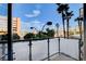Balcony view with tropical trees and a city landscape at 353 E Bonneville Ave # 181/281, Las Vegas, NV 89101