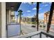 View from the balcony shows palm trees and a street with light traffic at 353 E Bonneville Ave # 181/281, Las Vegas, NV 89101