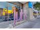 Modern building exterior featuring the 'Juhl' sign and reflective glass windows at 353 E Bonneville Ave # 181/281, Las Vegas, NV 89101