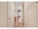 Hallway featuring tile flooring, with doors leading to other rooms at 353 E Bonneville Ave # 181/281, Las Vegas, NV 89101