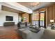 Spacious living room with hardwood floors, neutral-toned furniture, and modern fixtures at 353 E Bonneville Ave # 181/281, Las Vegas, NV 89101