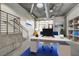 Modern office space with exposed ductwork and an open staircase at 353 E Bonneville Ave # 181/281, Las Vegas, NV 89101