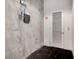 Bare storage area with exposed concrete wall and single light-colored louvered door at 353 E Bonneville Ave # 181/281, Las Vegas, NV 89101
