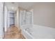Bathroom showcasing a soaking tub and glass-enclosed shower at 353 E Bonneville Ave # 503, Las Vegas, NV 89101