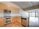 Modern kitchen features stainless steel appliances, granite countertops, and light wood cabinetry at 353 E Bonneville Ave # 503, Las Vegas, NV 89101