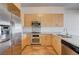 Modern kitchen with stainless steel appliances and granite countertops at 353 E Bonneville Ave # 503, Las Vegas, NV 89101