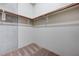 Spacious walk-in closet with ample storage and neutral carpeting at 353 E Bonneville Ave # 503, Las Vegas, NV 89101