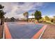 Large backyard features a full sport court with basketball and net sports at 382 Chaplin Cove Ave, Las Vegas, NV 89183