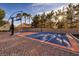 Backyard basketball court perfect for sports and fun on a sunny day at 382 Chaplin Cove Ave, Las Vegas, NV 89183