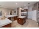 Gourmet kitchen with stainless steel appliances, ample counter space, and a center island for food preparation at 382 Chaplin Cove Ave, Las Vegas, NV 89183