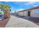 This property features a long driveway, desert landscaping and gated entry at 4137 Buffalo Bill Ave, Las Vegas, NV 89110