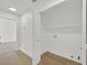 Spacious laundry area with bright lighting and hardwood floors ready for appliance hookups at 4137 Buffalo Bill Ave, Las Vegas, NV 89110