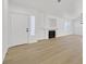 Bright living room with hardwood floors, fireplace and plenty of natural light at 4137 Buffalo Bill Ave, Las Vegas, NV 89110