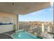 Balcony featuring a hot tub and incredible views of Las Vegas during the daytime at 4381 W Flamingo Rd # 57306, Las Vegas, NV 89103