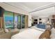 Luxurious bedroom with a city view from the balcony and elegant modern furniture at 4381 W Flamingo Rd # 57306, Las Vegas, NV 89103