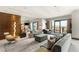 Expansive living room with stylish furnishings and multiple seating areas perfect for entertaining at 4381 W Flamingo Rd # 57306, Las Vegas, NV 89103
