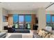Stylish living room with modern furnishings and expansive windows offering stunning views of the Las Vegas Strip at 4381 W Flamingo Rd # 57306, Las Vegas, NV 89103