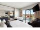 Bright, airy bedroom features an outdoor view, a soaking tub, and a cozy seating area, seamlessly blending comfort at 4381 W Flamingo Rd # 57306, Las Vegas, NV 89103