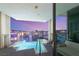Balcony pool overlooking city with glass railings and seating; enjoy luxurious views from your own private oasis at 4381 W Flamingo Rd # 57306, Las Vegas, NV 89103