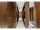 Spacious walk-in closet with custom shelving, mirrored accents, and ample storage space at 4381 W Flamingo Rd # 57306, Las Vegas, NV 89103