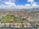 Neighborhood aerial view highlighting houses, green spaces, desert landscaping, and streetscapes at 4624 Ventana Rey St, North Las Vegas, NV 89081
