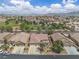 Aerial view of a well-maintained property with a manicured lawn and inviting curb appeal at 4624 Ventana Rey St, North Las Vegas, NV 89081
