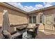 Inviting outdoor lounge area featuring a fire pit and ample seating at 4624 Ventana Rey St, North Las Vegas, NV 89081