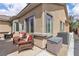 Charming outdoor patio area with comfortable seating and a well-maintained exterior at 4624 Ventana Rey St, North Las Vegas, NV 89081