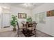 Cozy dining area with a table and chairs, and natural light from the window at 4808 Straight Flush Dr # 103, Las Vegas, NV 89122