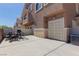 Spacious backyard patio area featuring outdoor seating and a barbecue grill for entertaining at 4808 Straight Flush Dr # 103, Las Vegas, NV 89122