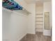 Spacious walk-in closet with shelves and plenty of space for storage and organization at 4808 Straight Flush Dr # 103, Las Vegas, NV 89122