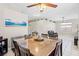Open concept dining area boasts elegant decor and seamless access to the living room at 5224 Red Vine St, North Las Vegas, NV 89031