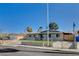Inviting single-story home featuring a freshly painted exterior and gated front yard at 5409 Holmby Ave, Las Vegas, NV 89146