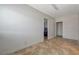 Simple bonus room featuring tile floors and access to other rooms, offering versatility at 5409 Holmby Ave, Las Vegas, NV 89146