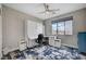 Multi-functional bedroom featuring a work area, and a fold-down bed at 5479 Tamar Ridge Ct, Las Vegas, NV 89141
