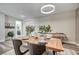 Bright dining room with stylish table setting and elegant contemporary decor at 5479 Tamar Ridge Ct, Las Vegas, NV 89141