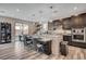 Spacious kitchen with a large island, stainless steel appliances, and pendant lighting at 5479 Tamar Ridge Ct, Las Vegas, NV 89141