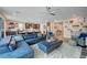 Spacious living room with plush seating, modern decor, and open concept design at 5479 Tamar Ridge Ct, Las Vegas, NV 89141