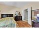 Main bedroom with wood flooring is bright and offers ample space at 6160 Majestic Wind Ave, Las Vegas, NV 89122