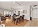 Open living area with hardwood floors, ceiling fan, and easy access to kitchen and dining areas at 6160 Majestic Wind Ave, Las Vegas, NV 89122