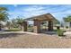 Outdoor pavilion perfect for picnics and events with stone pillars and seating in a community area at 6160 Majestic Wind Ave, Las Vegas, NV 89122
