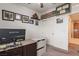 Bedroom setup as an office with a desk and decorations on the wall at 6317 Highledge St, North Las Vegas, NV 89081