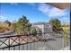 Outdoor view from balcony of neighborhood homes, landscaping, and a mountain backdrop at 644 Chase Tree St, Las Vegas, NV 89144