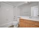 Bathroom featuring a bathtub and shower combination and modern fixtures at 644 Chase Tree St, Las Vegas, NV 89144