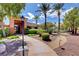 Beautiful community clubhouse surrounded by lush landscaping and walkways at 644 Chase Tree St, Las Vegas, NV 89144